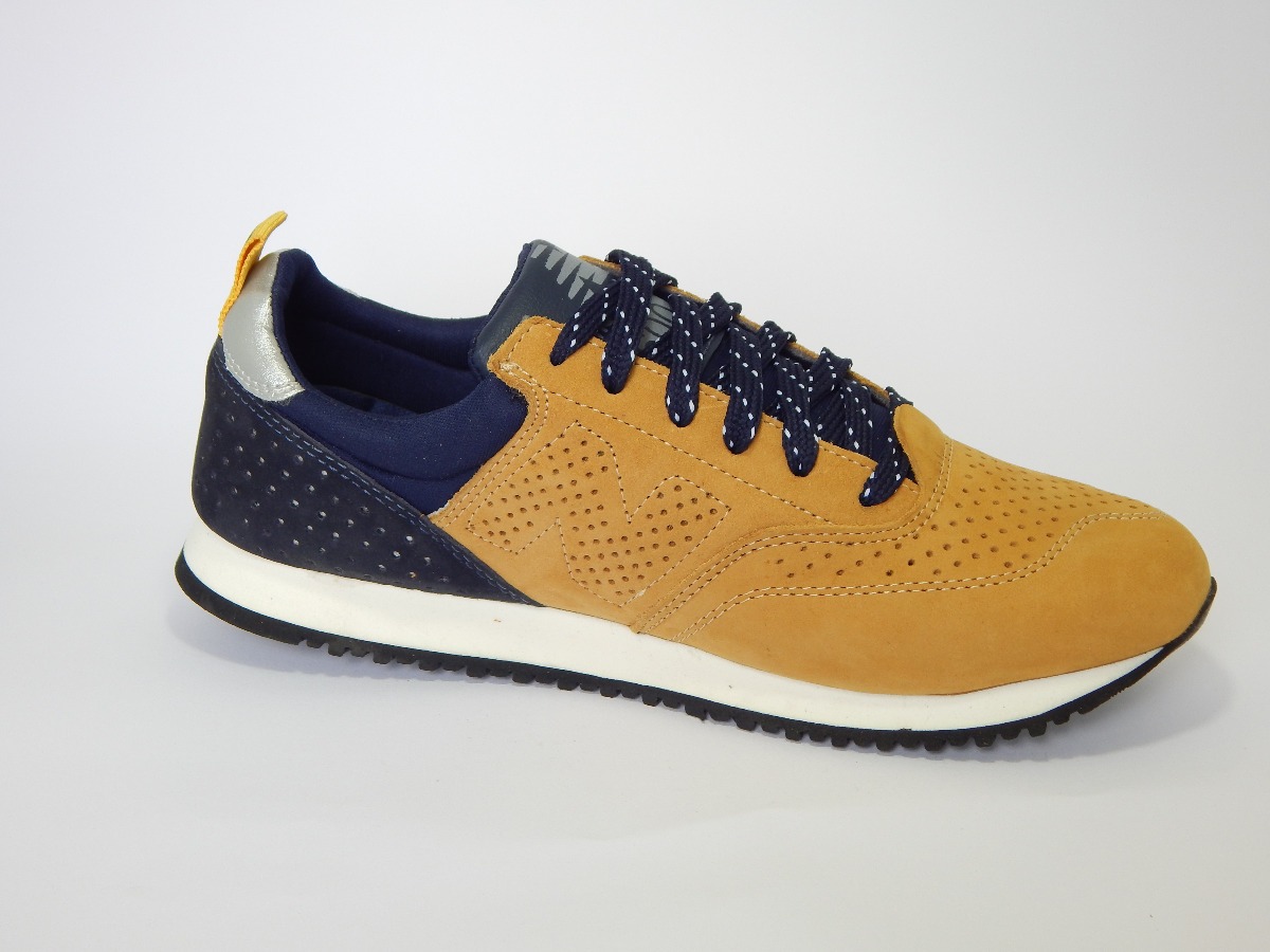 new balance 600c amarelo